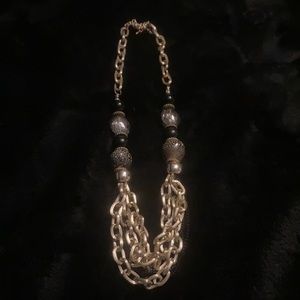 Long gold beaded necklace